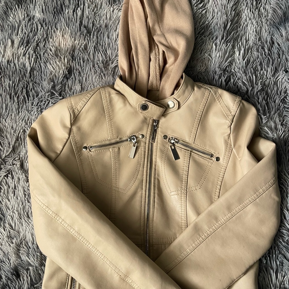 Nice cream leather jacket that will go with any look for a nice price.